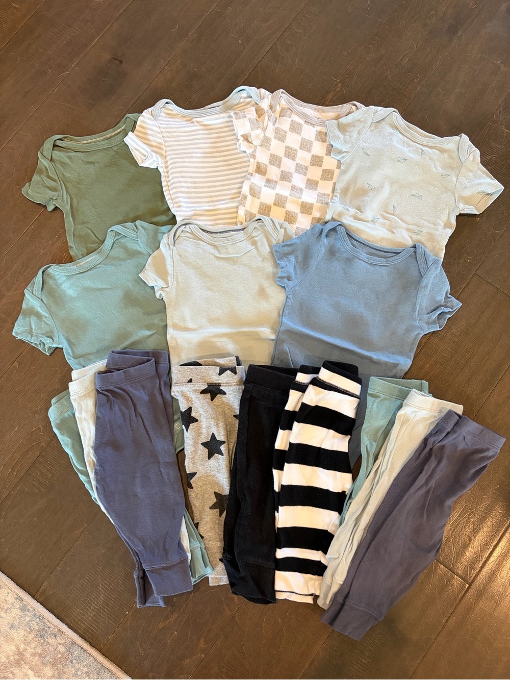 Set of 7 bodysuits and 9 pants